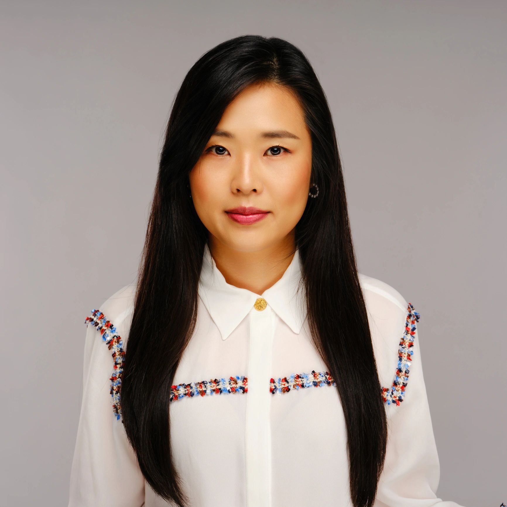 Professional headshot representing merchandising and restocking leadership