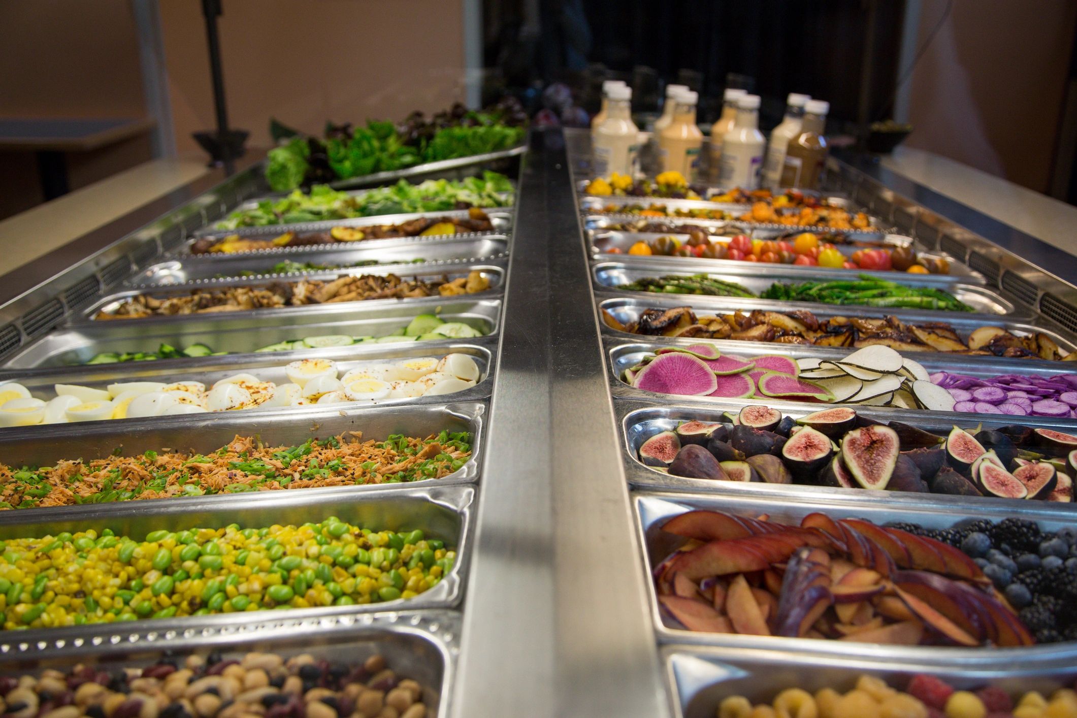 Fresh grab-and-go food options displayed in a self-serve setting
